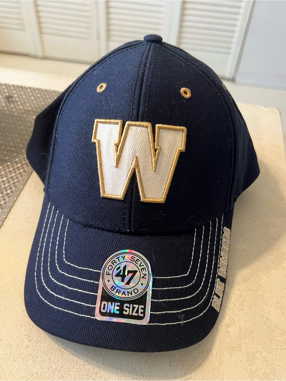 Winnipeg Blue Blombers Baseball Cap with White and Gold 'W' Embroidery